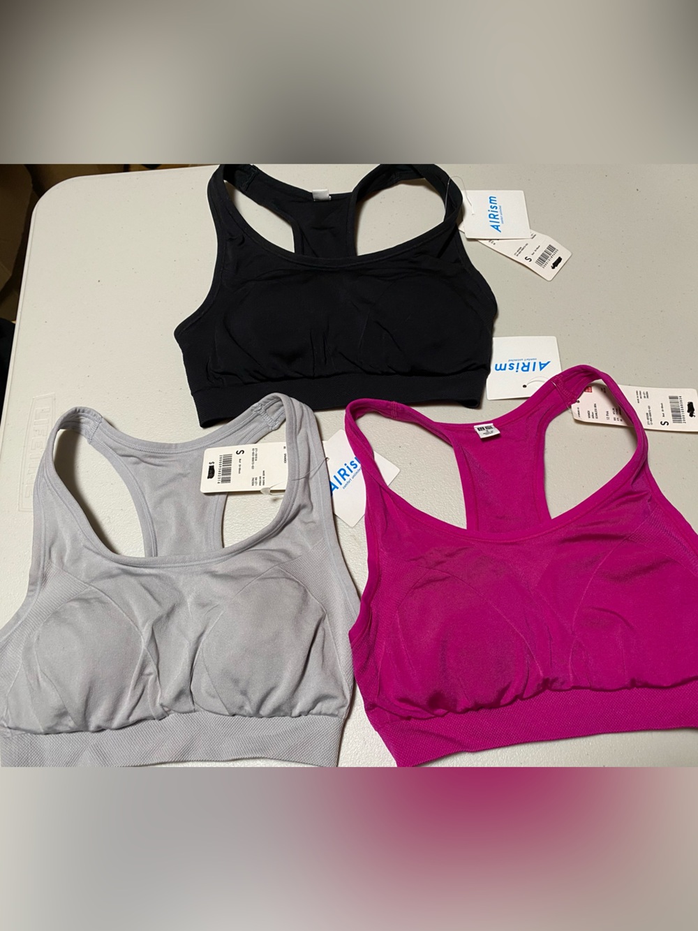 3 for $40 Uniqlo Women's Seamless Stretch Sports Bra - Black, Gray, Fuchsia S